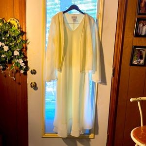 Long beige dresses event dress, with connected jacket long sleeves jacket.